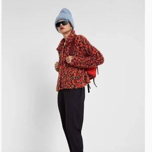 NWT multicolored fuzzy button sweater